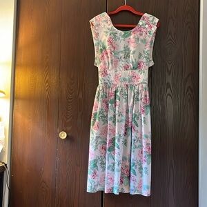 No brand vintage, midi dress. White with pink and green flowers. Size Small